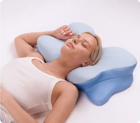 Side sleeper using Derila Ergo Pillow shoulder wing